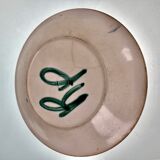 Flat ceramic plate by <Robert Picault