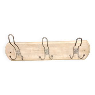 Wooden wall-mounted coat rack