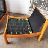 Pair of designer leather armchairs 80s