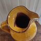 Large vintage enamelled terracotta pitcher