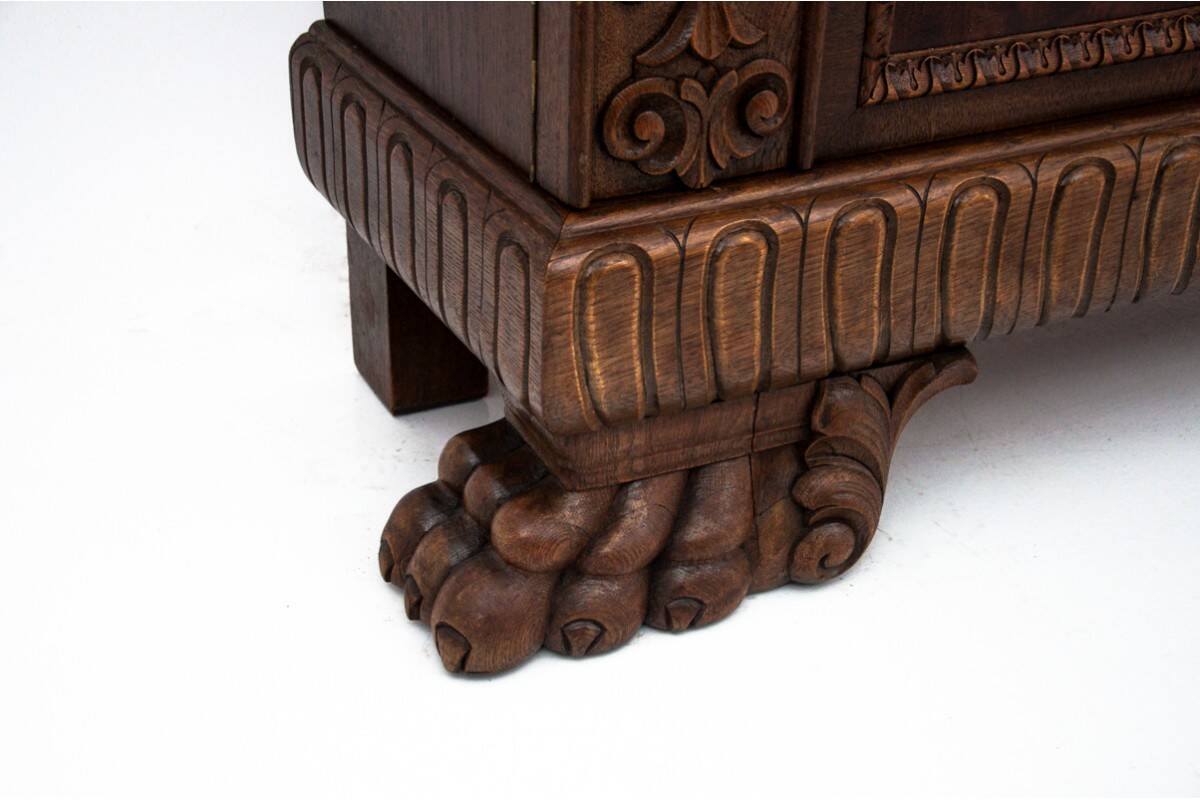 Cabinet set on lion's paws, Germany, early 20th century.