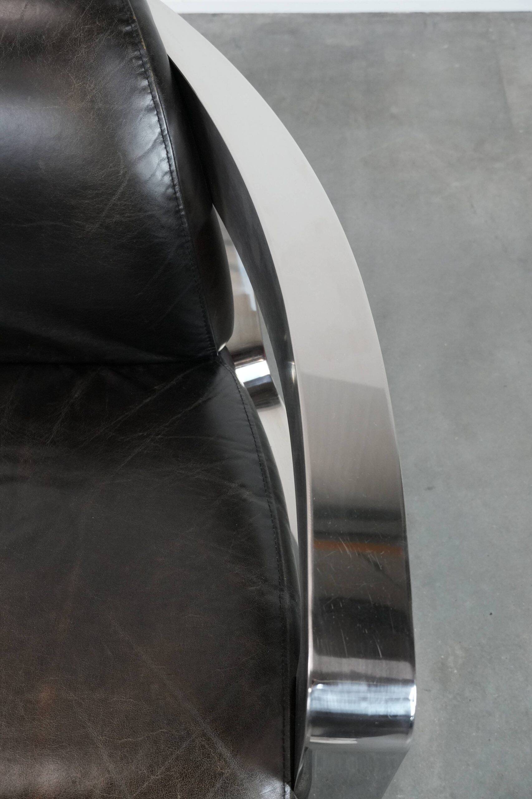 Unique design Aviator armchair with an aluminium frame