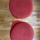 Pair of low tulip stools in red metal 1970