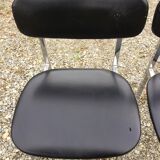 6 vintage chairs in black skaï with chrome metal tubular base.