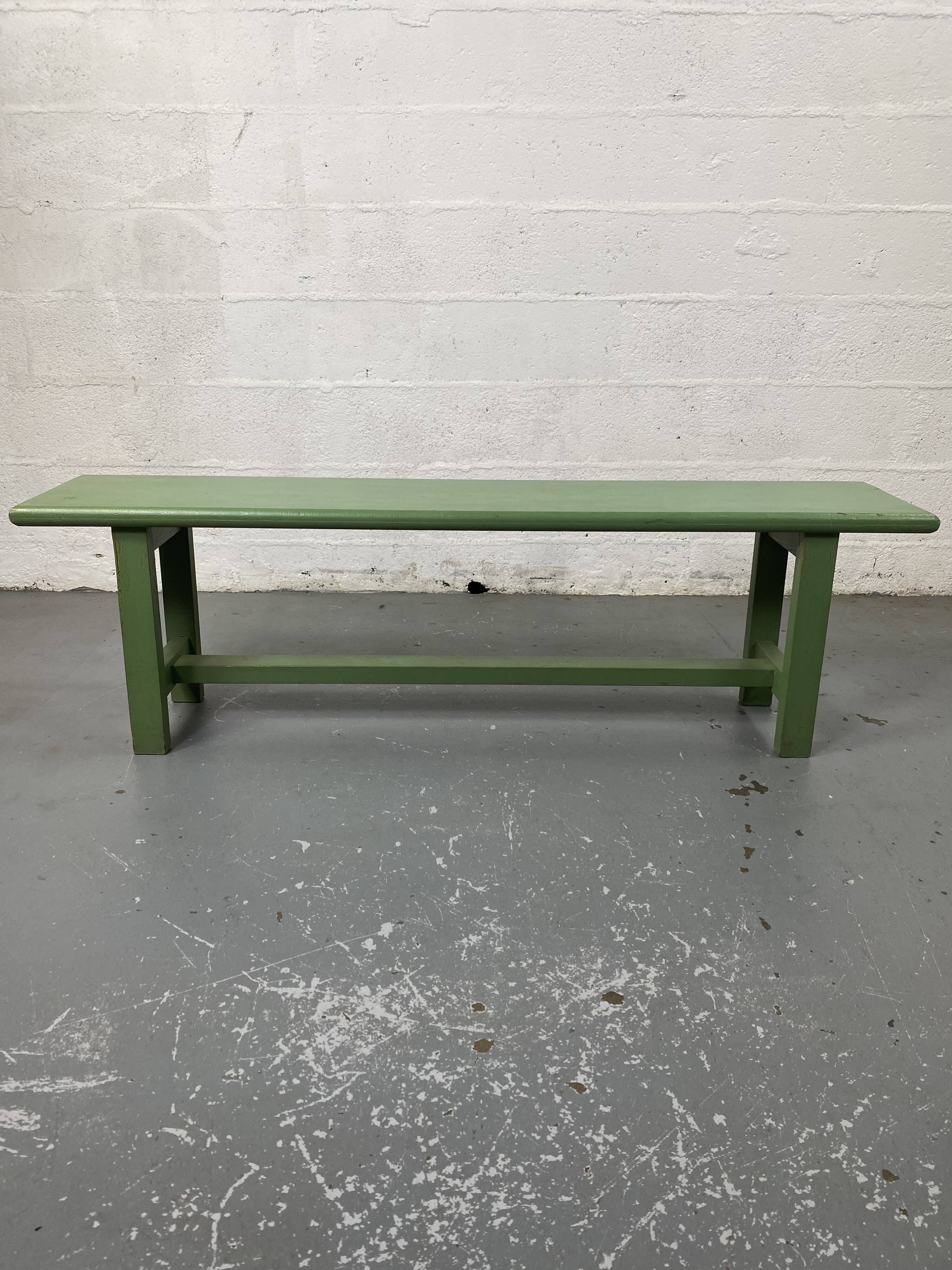 Green wooden bench