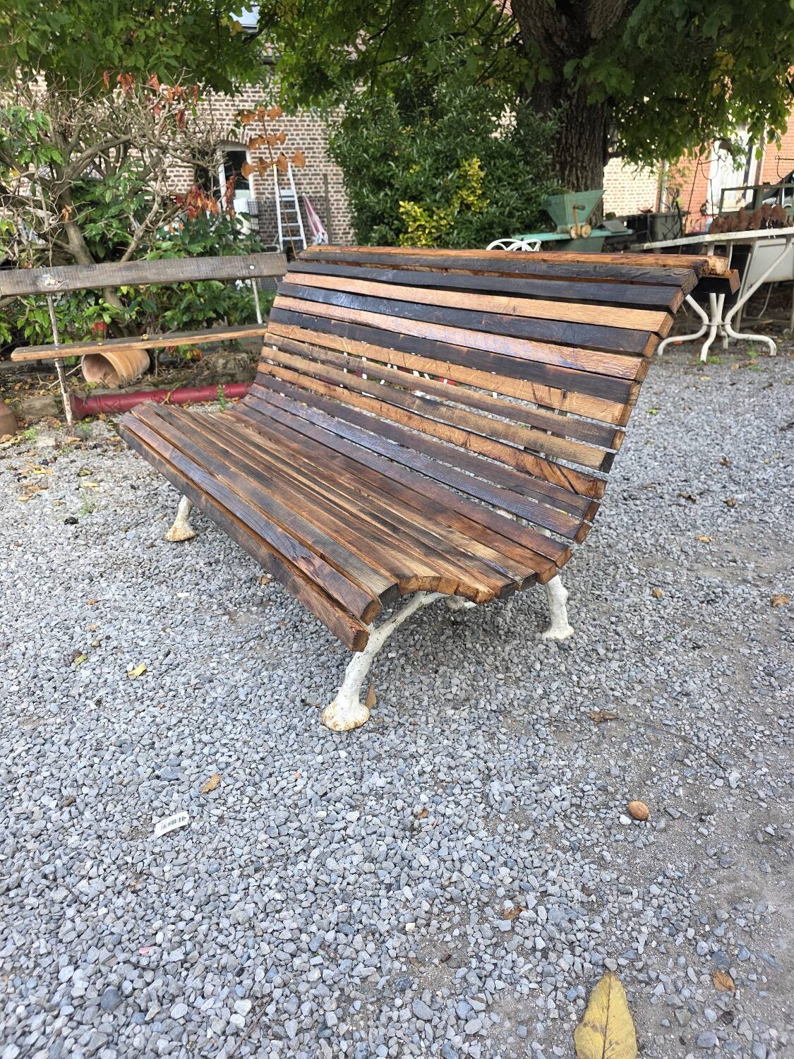 Cast iron and oak slatted garden bench