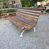 Cast iron and oak slatted garden bench