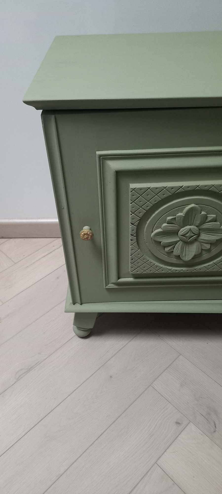 Bedside table with floral carvings