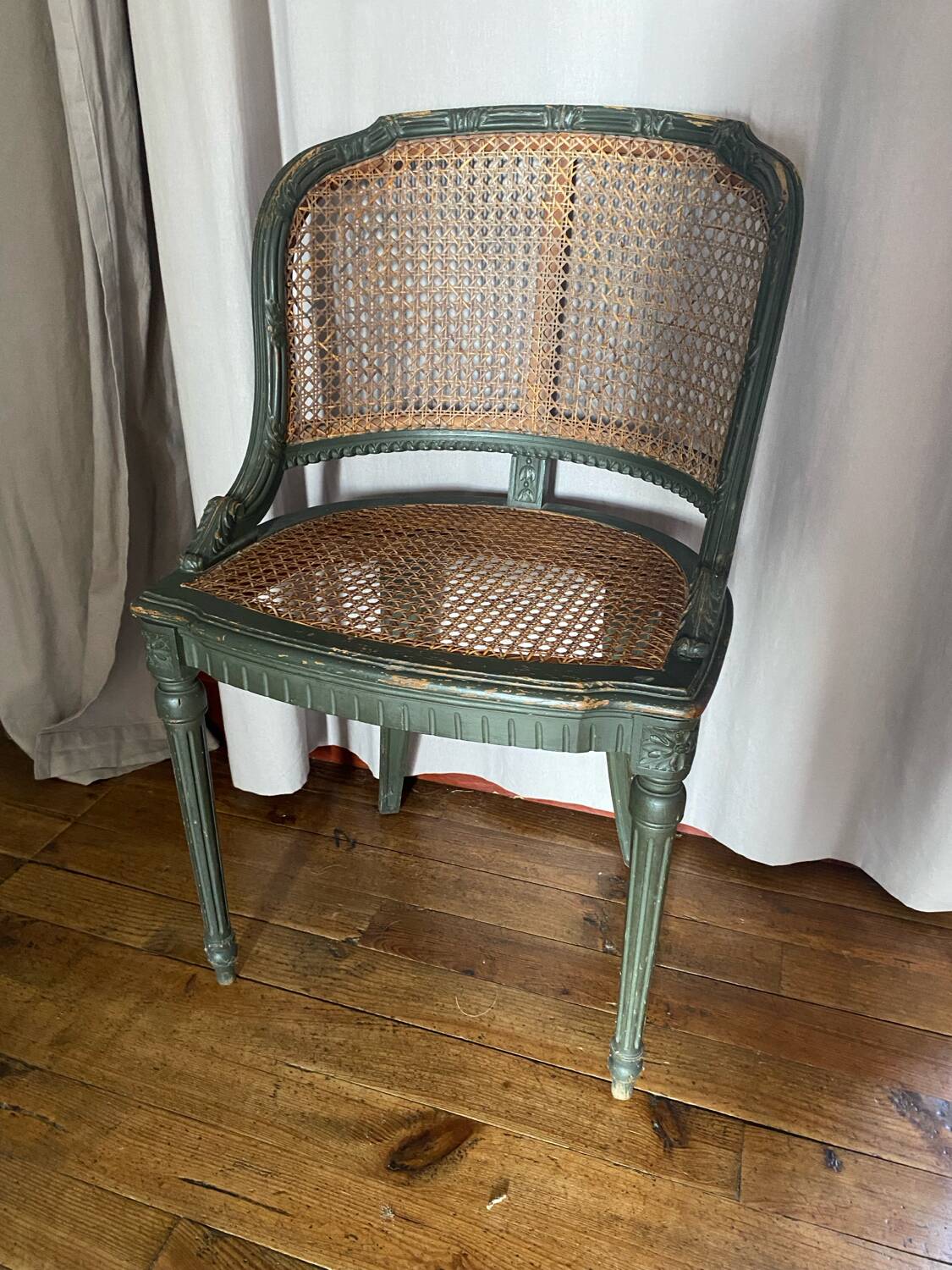 Caned armchair in Louis XVI style