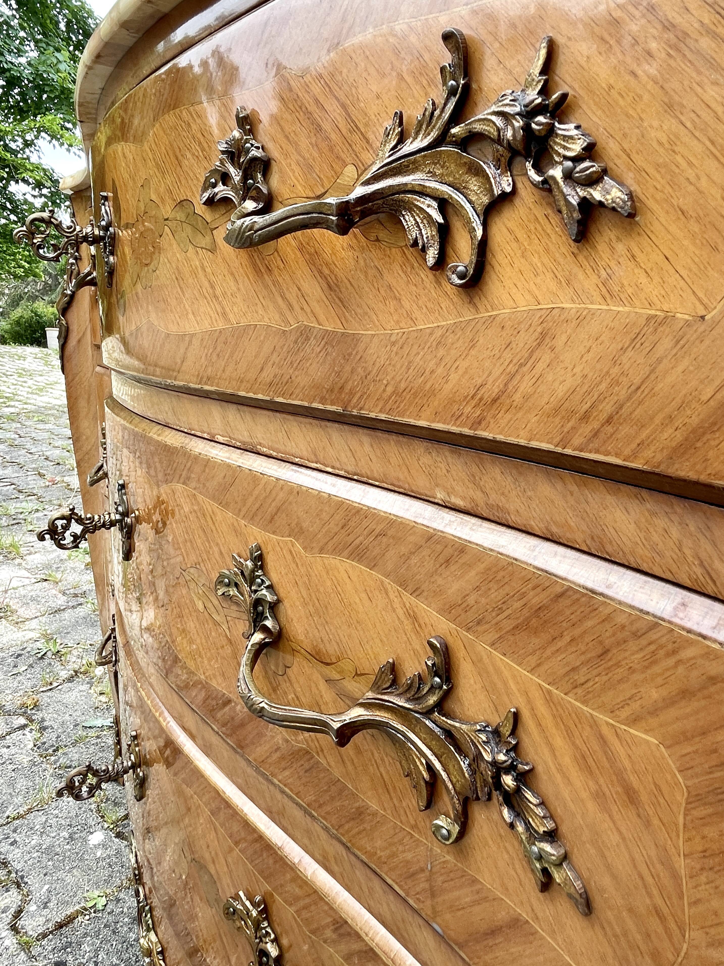Louis XV style commode in marquetry, 20th century.