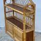 Small vintage 1970s rattan wall shelf with 2 doors.