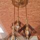 Suspension design in brass and smoked glass
