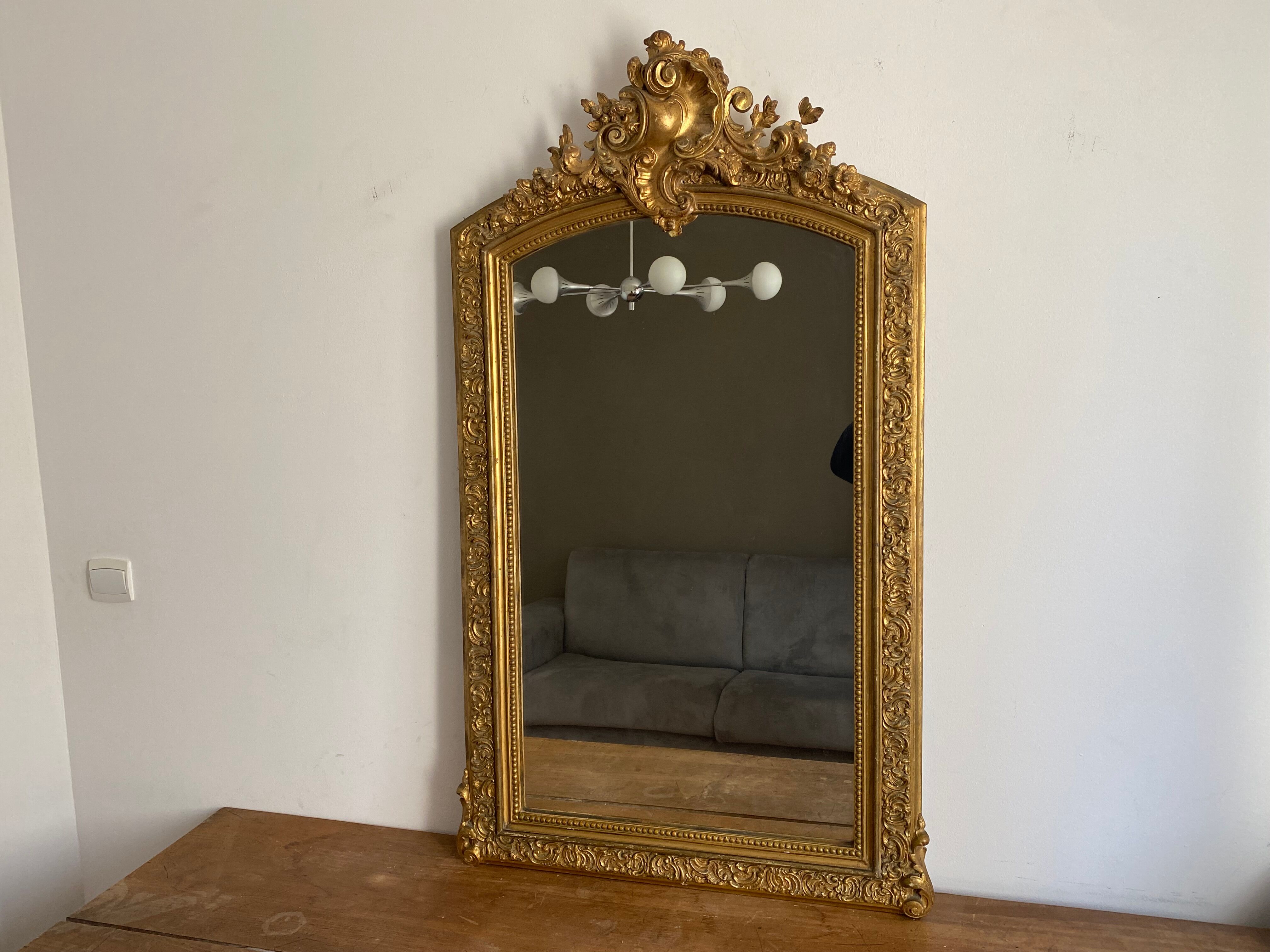 Late 19th century gilded mirror with decorated pediment 125x70cm
