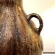 art nouveau brown 'colocynth' vase with three handles, roger guerin