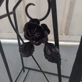Pink-decorated iron umbrella door.