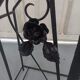 Pink-decorated iron umbrella door.