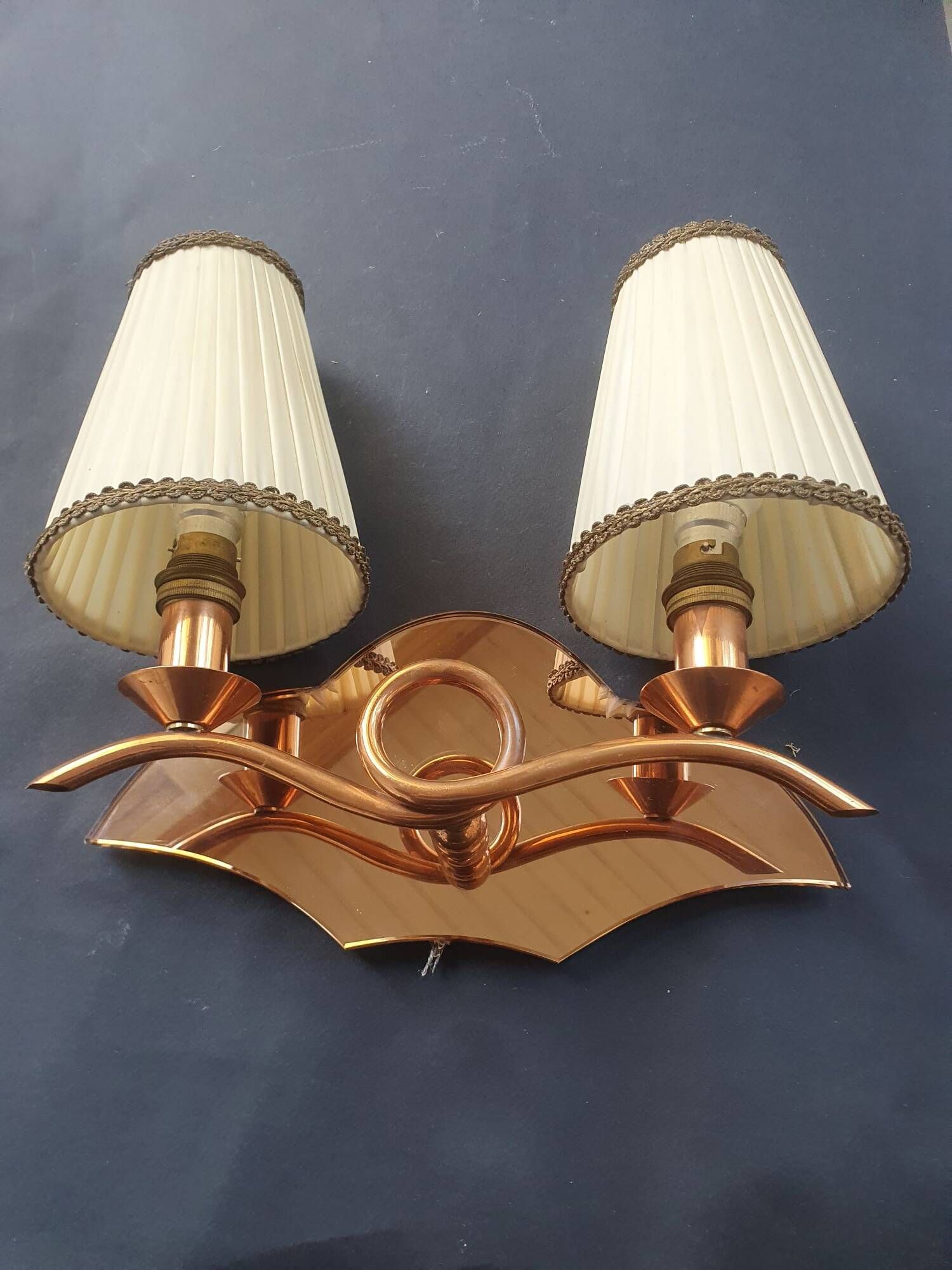 Copper wall lamp with 1940s Art Deco shades.
