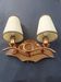 Copper wall lamp with 1940s Art Deco shades.
