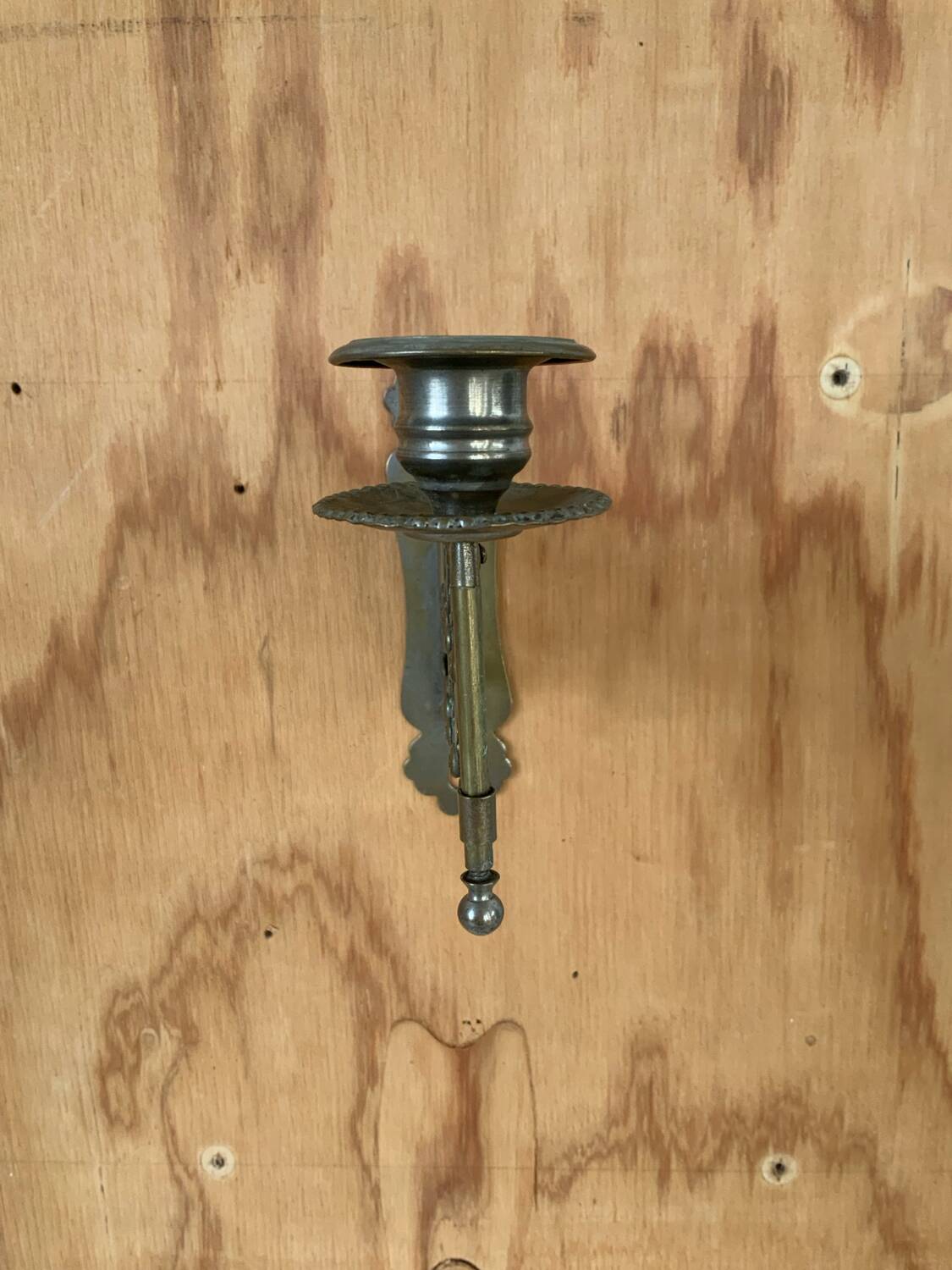 Old accordion candle holder