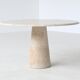 Large sculptural round dining table in cream white travertine, Italy, 1970.