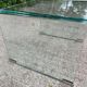 Vintage Italian coffee table with curved glass from the 1980s.