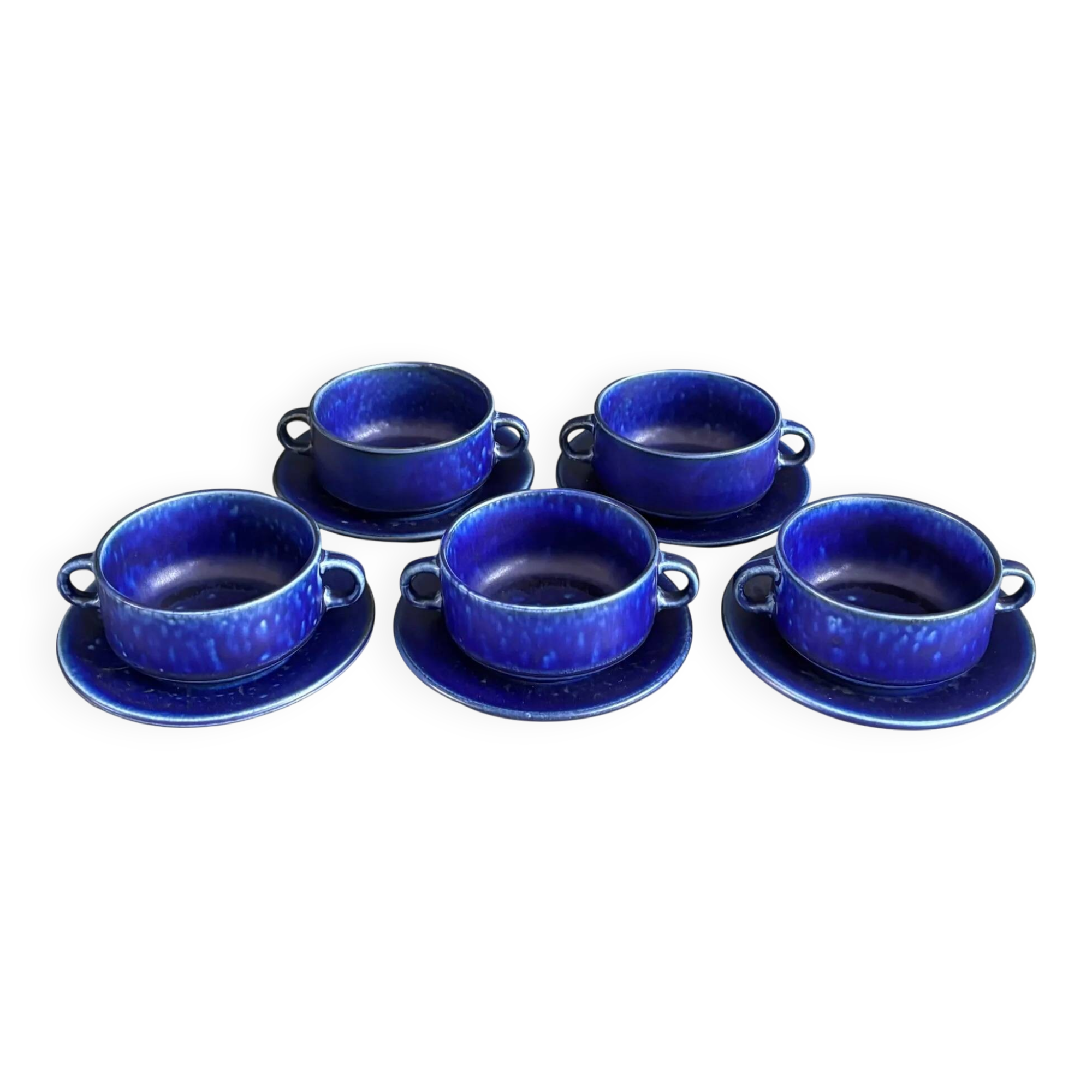 Set of 5 blue Klein ceramic tea cups with saucers.