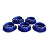 Set of 5 blue Klein ceramic tea cups with saucers.