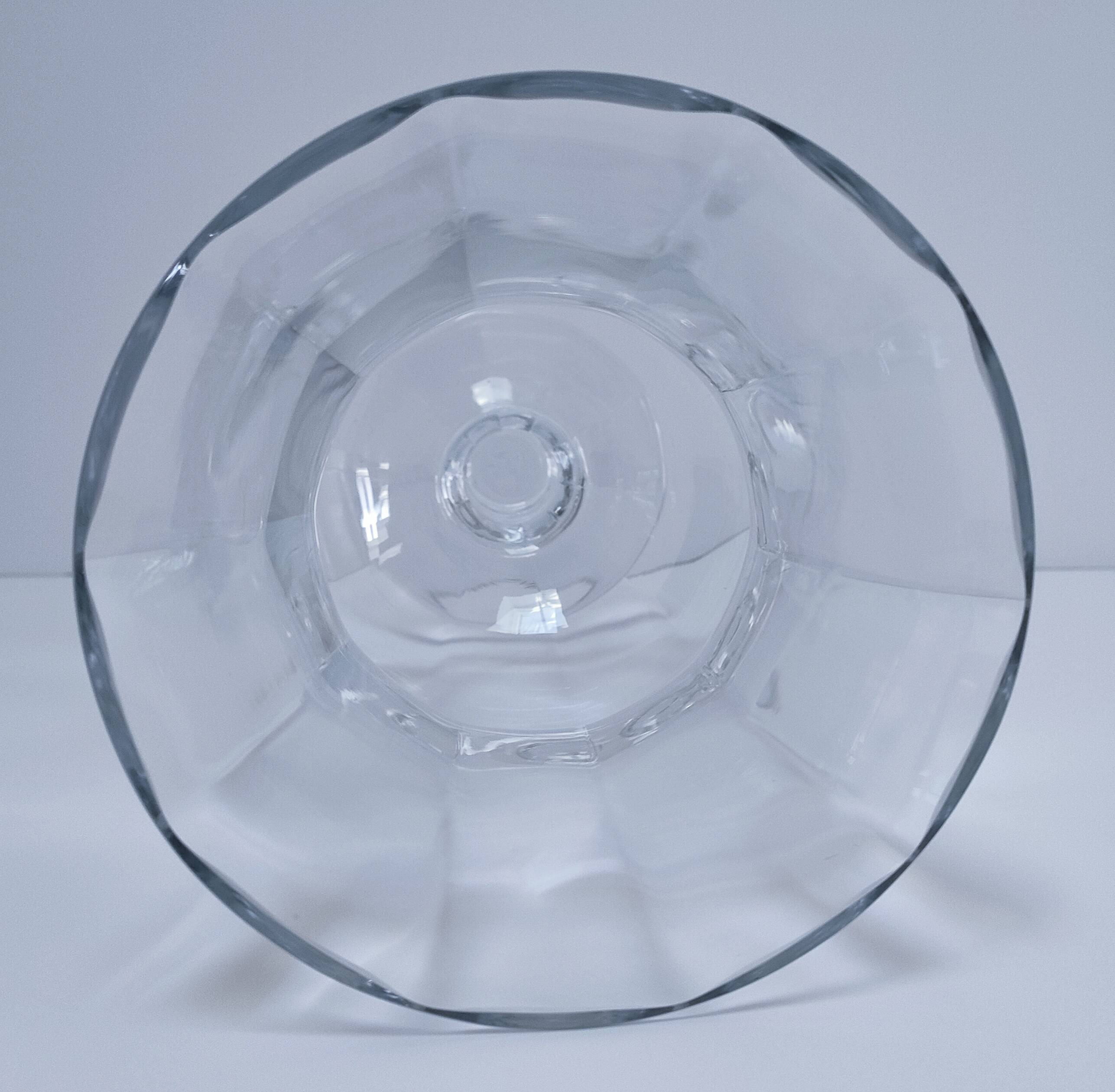 Pair of tall clear glass candlesticks from the early 20th century