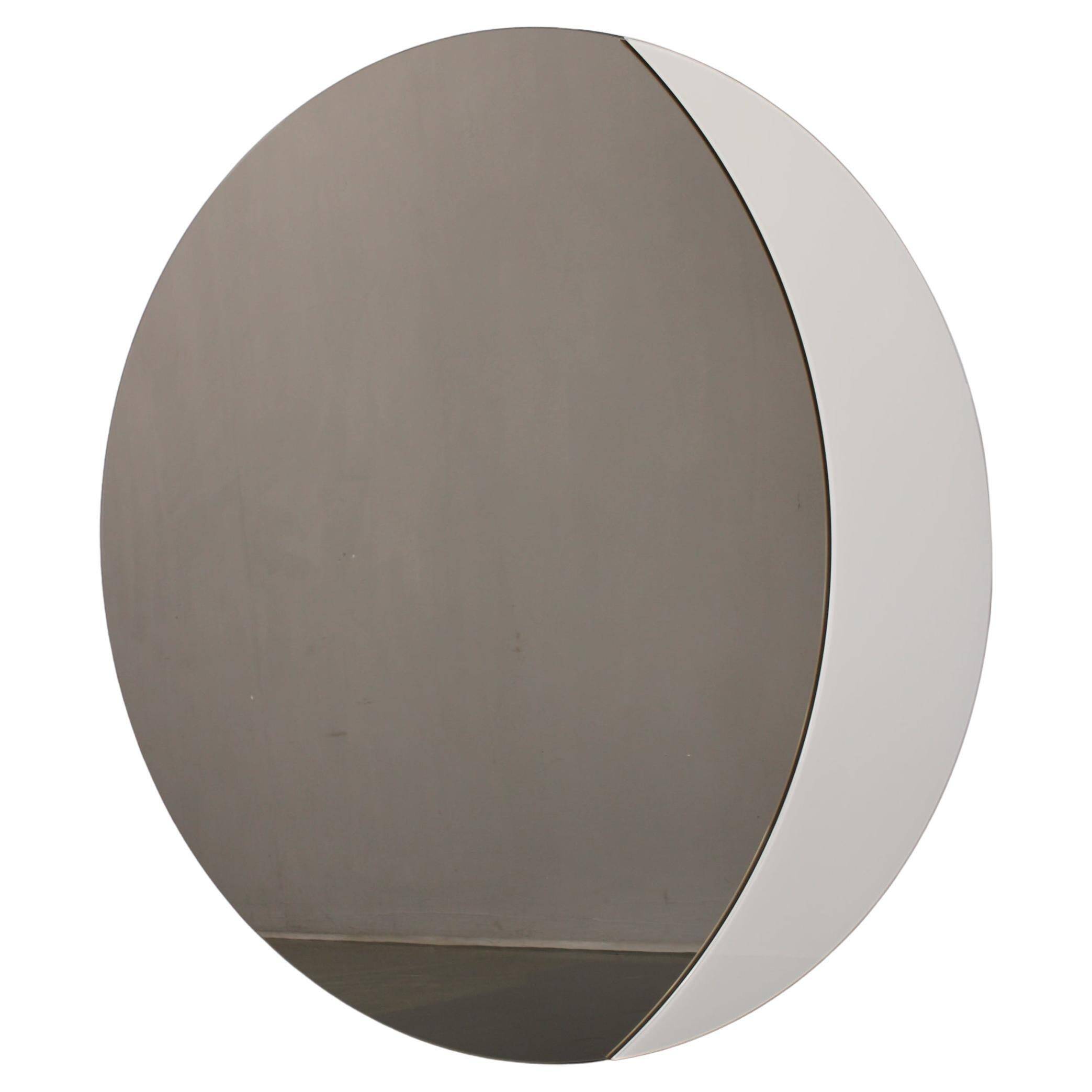 Large 1980s Italian smoke-tinted round mirror with white geometric segment