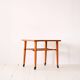 1960s teak coffee table on casters
