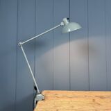 Grey two-arm Kaiser Idell clamp lamp model