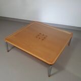 Rare coffee table 110 x 110 x height 35 cm with 8 flange wooden / cork caps in the glass top.