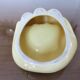 Empty hand-shaped pocket in pale yellow ceramic years70