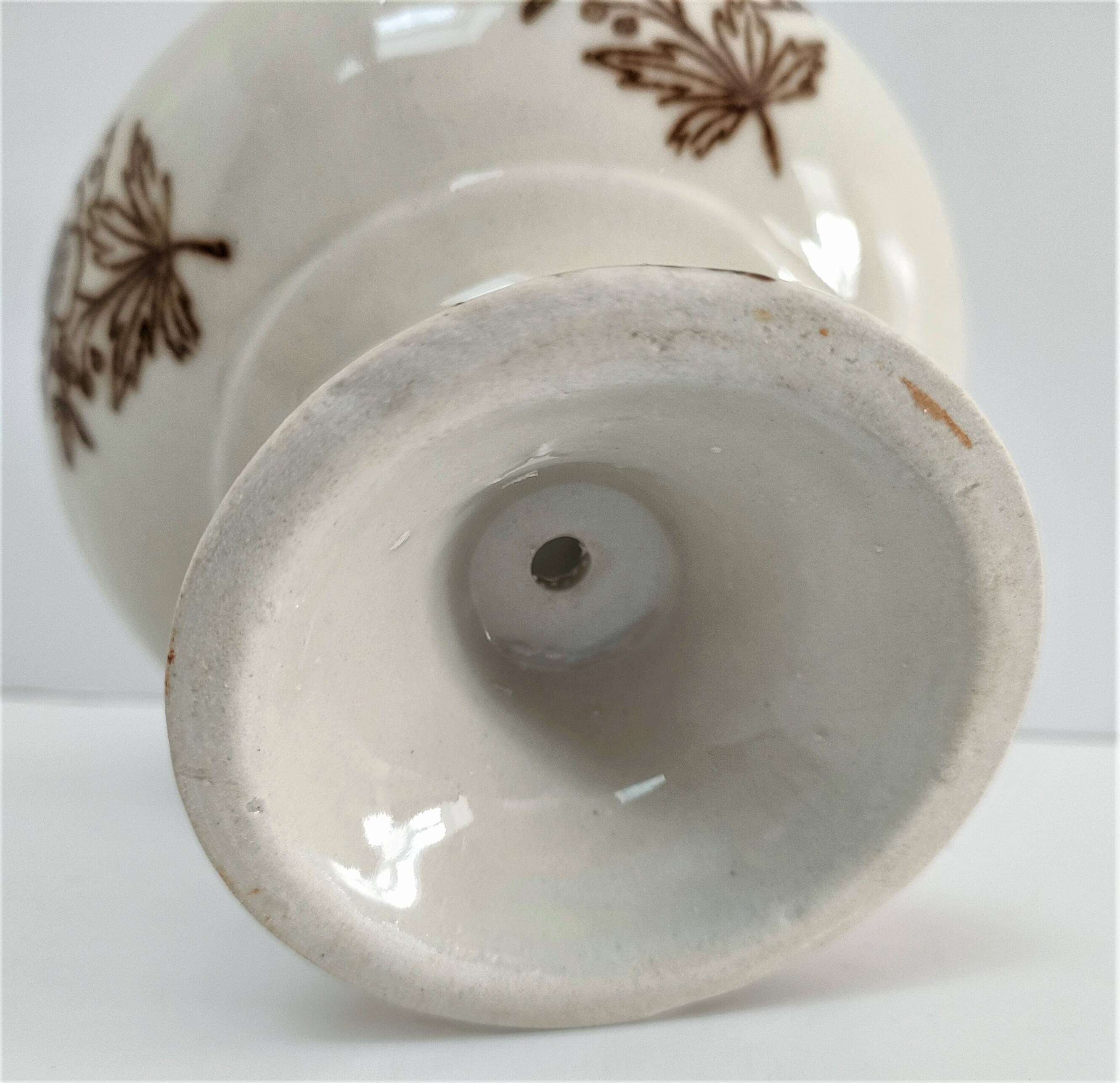 Three Saint-Uze ceramic tealight candle holders, early 20th century