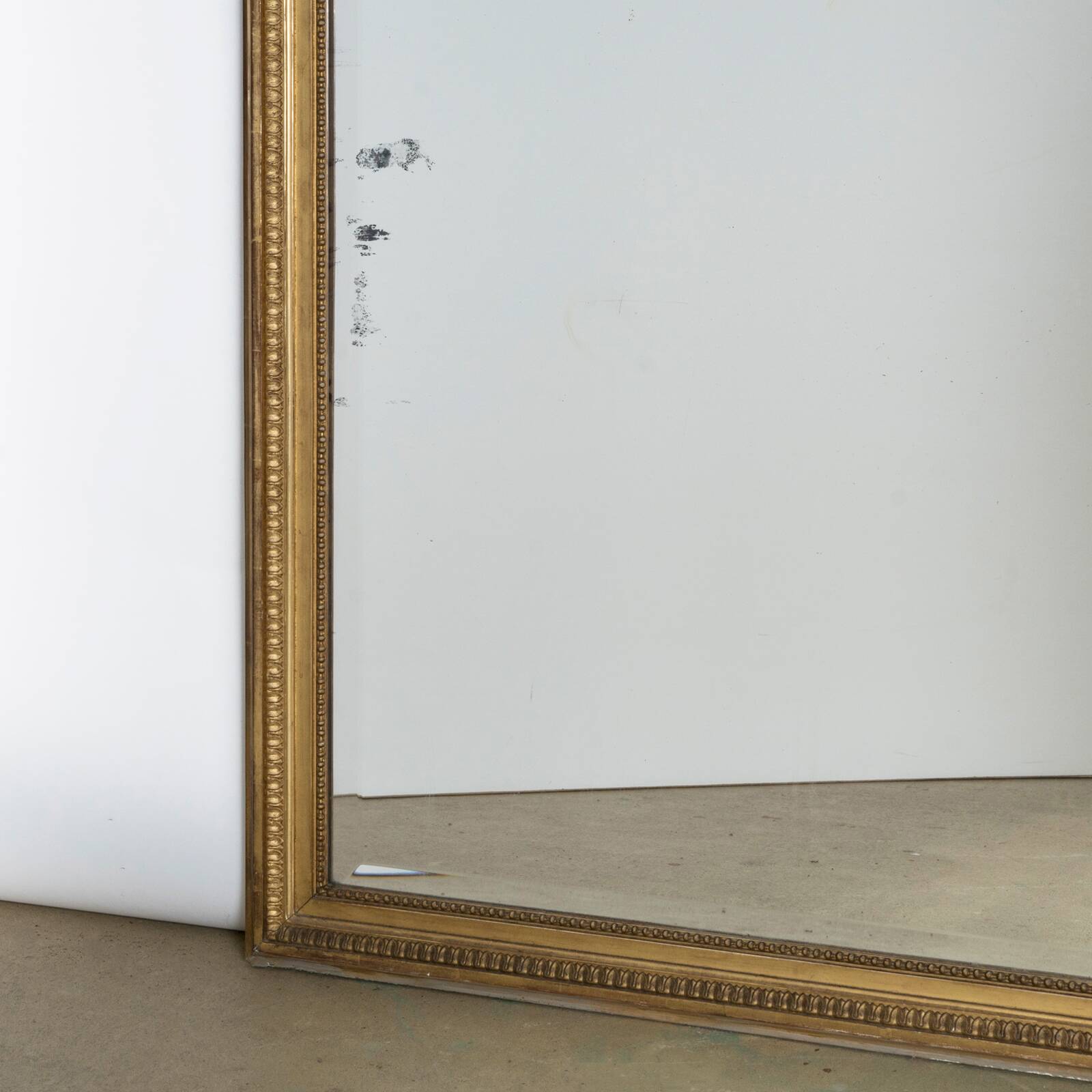 Large 19th c gilt wood bow cartouche mirror
