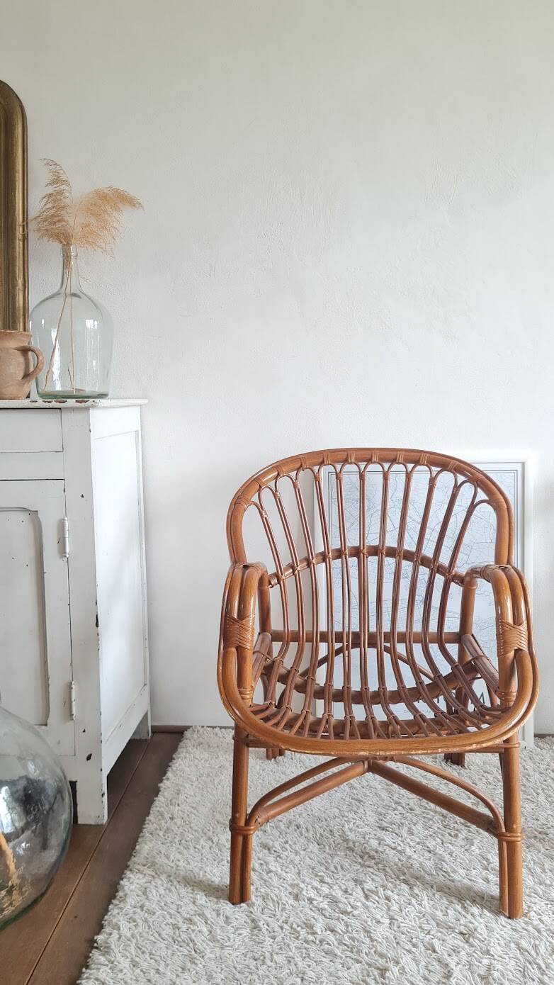 Pair of vintage rattan armchairs circa the 1970s.