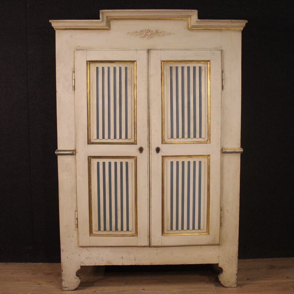 Antique lacquered and gilded Italian wardrobe in Louis XVI style from 19th century
