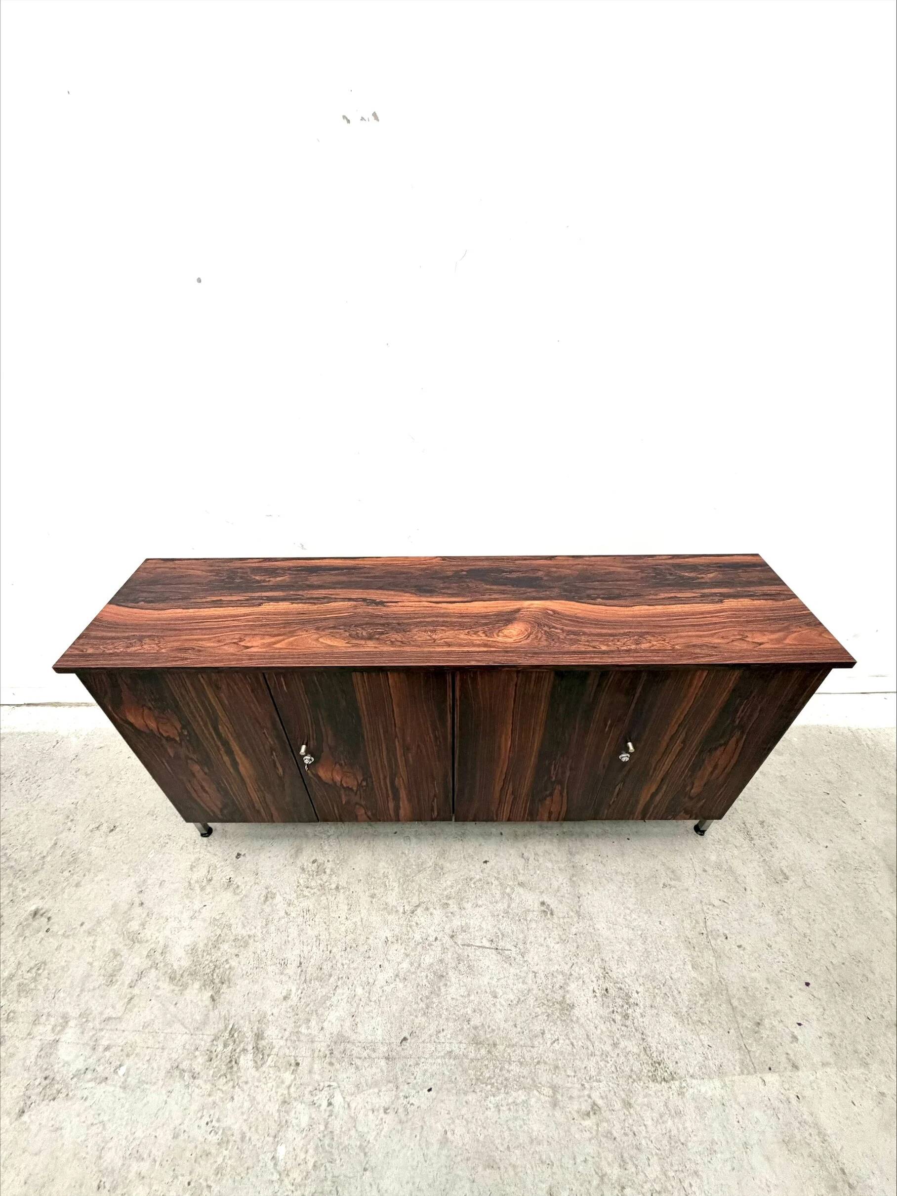 Enfilade in formica imitation rosewood with a chrome base, 1970.