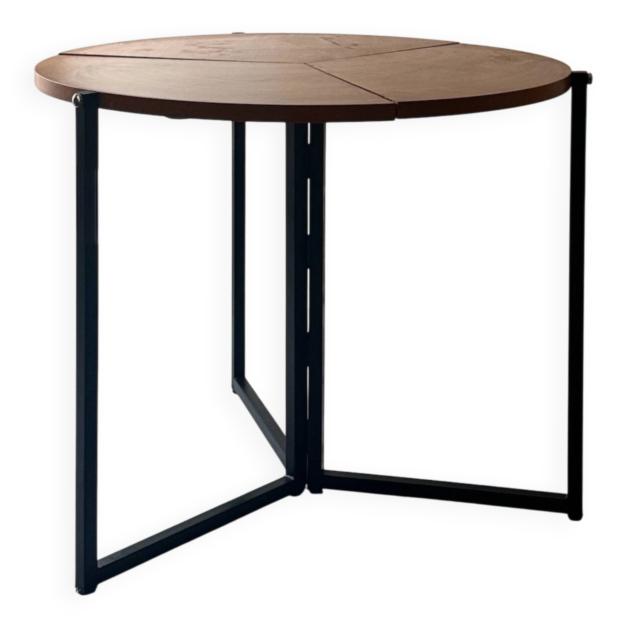 Modernist round folding dining table in wood and metal.