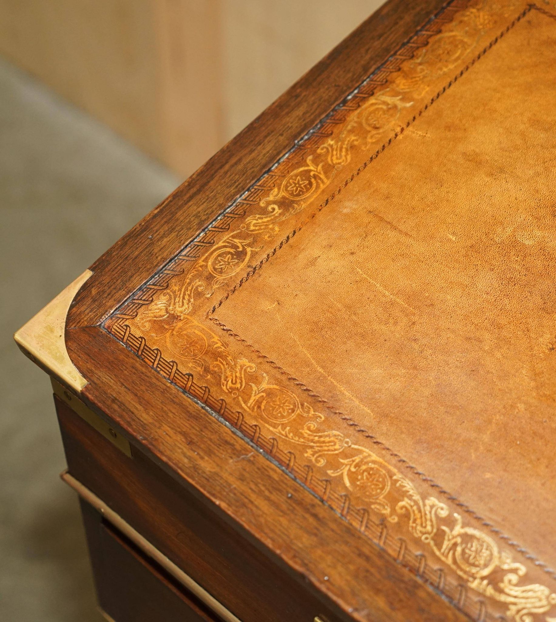 Victorian antique leather Davenport campaign desk with brass gallery.