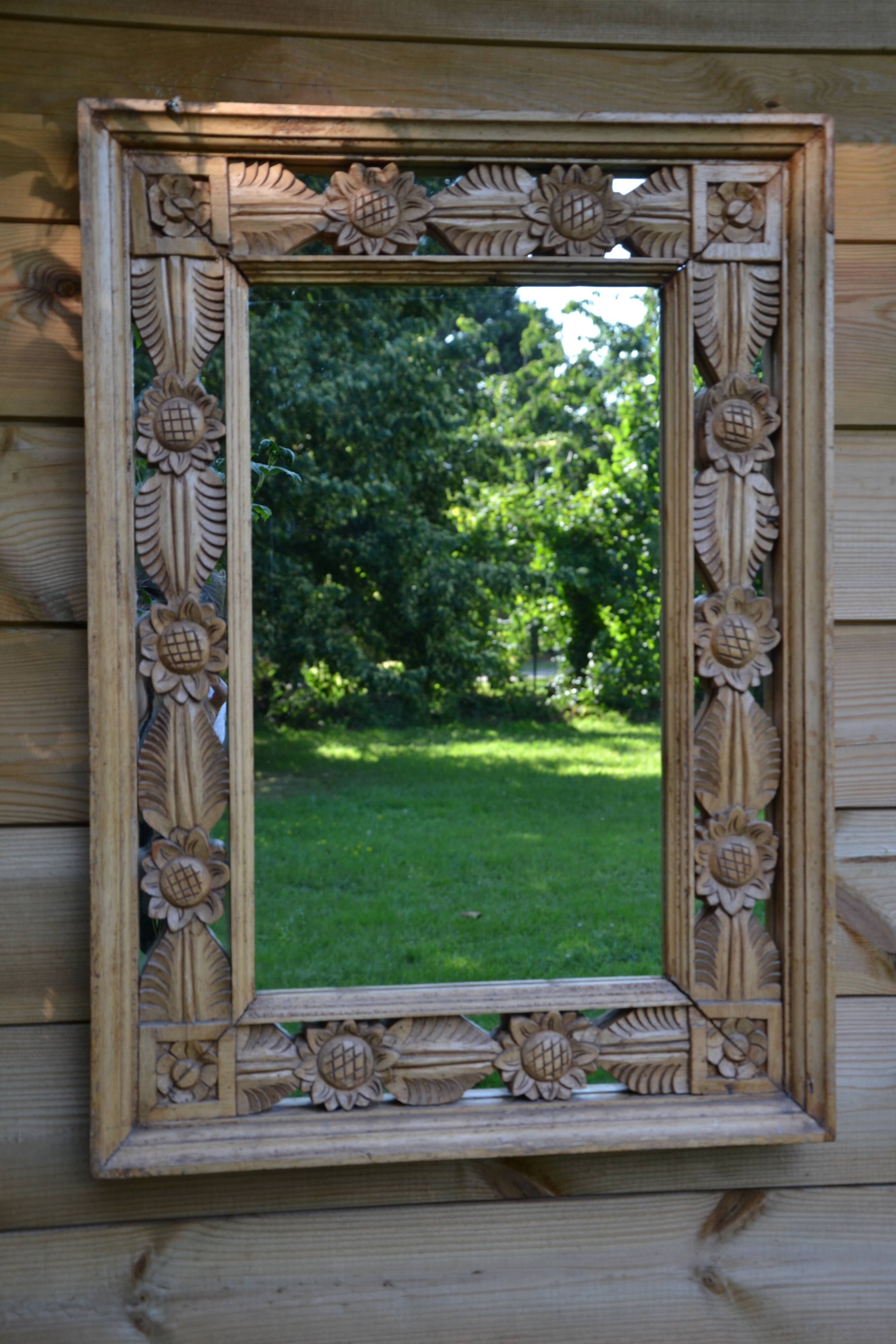 Large carved wooden mirror