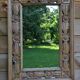 Large carved wooden mirror
