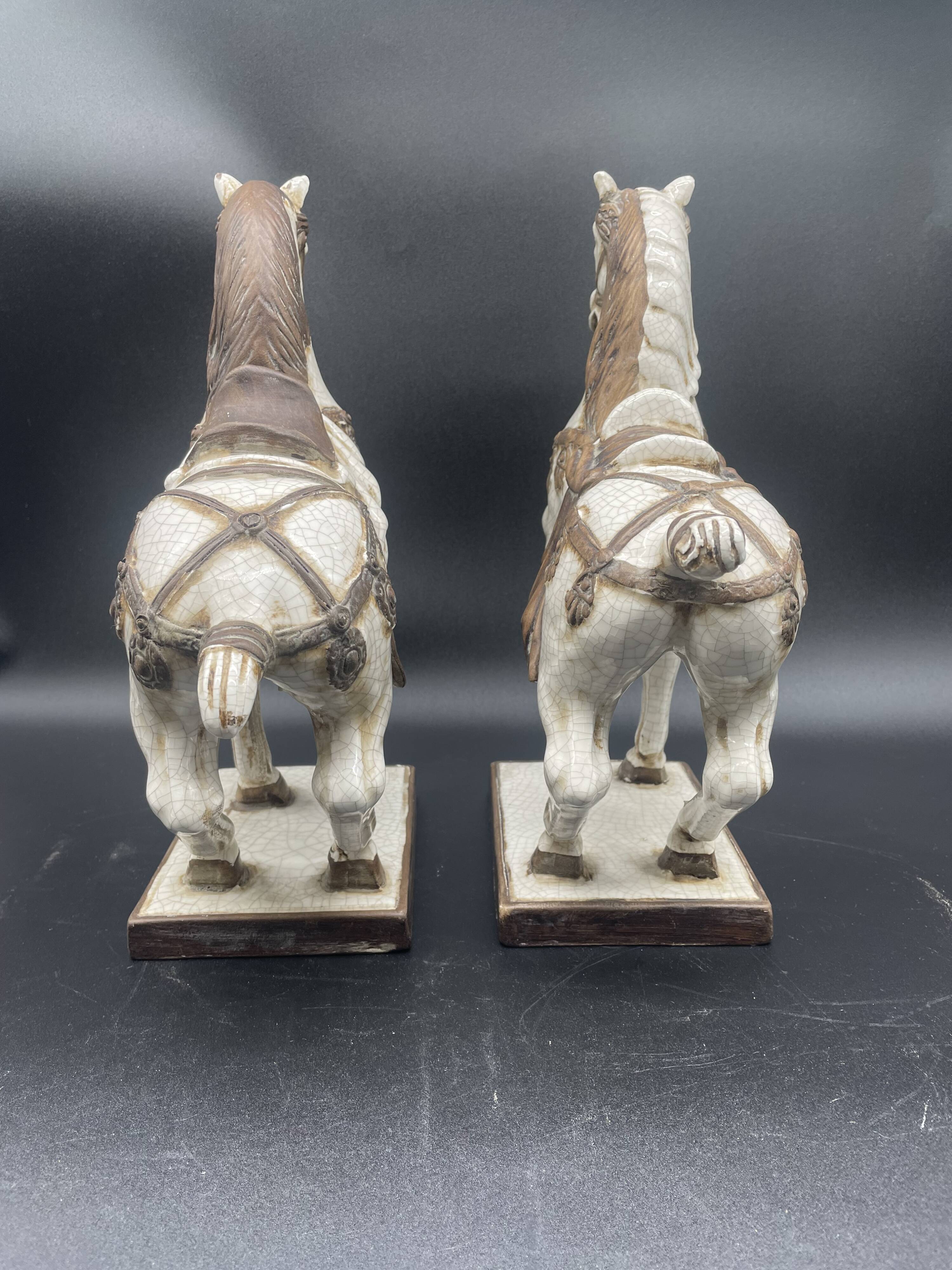 Large pair of crackled ceramic horses – China 20th century