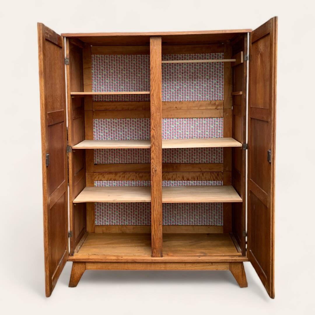 Solid oak compass foot cabinet René Gabriel 1945
