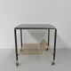 Vintage coffee table on castors with singles rack