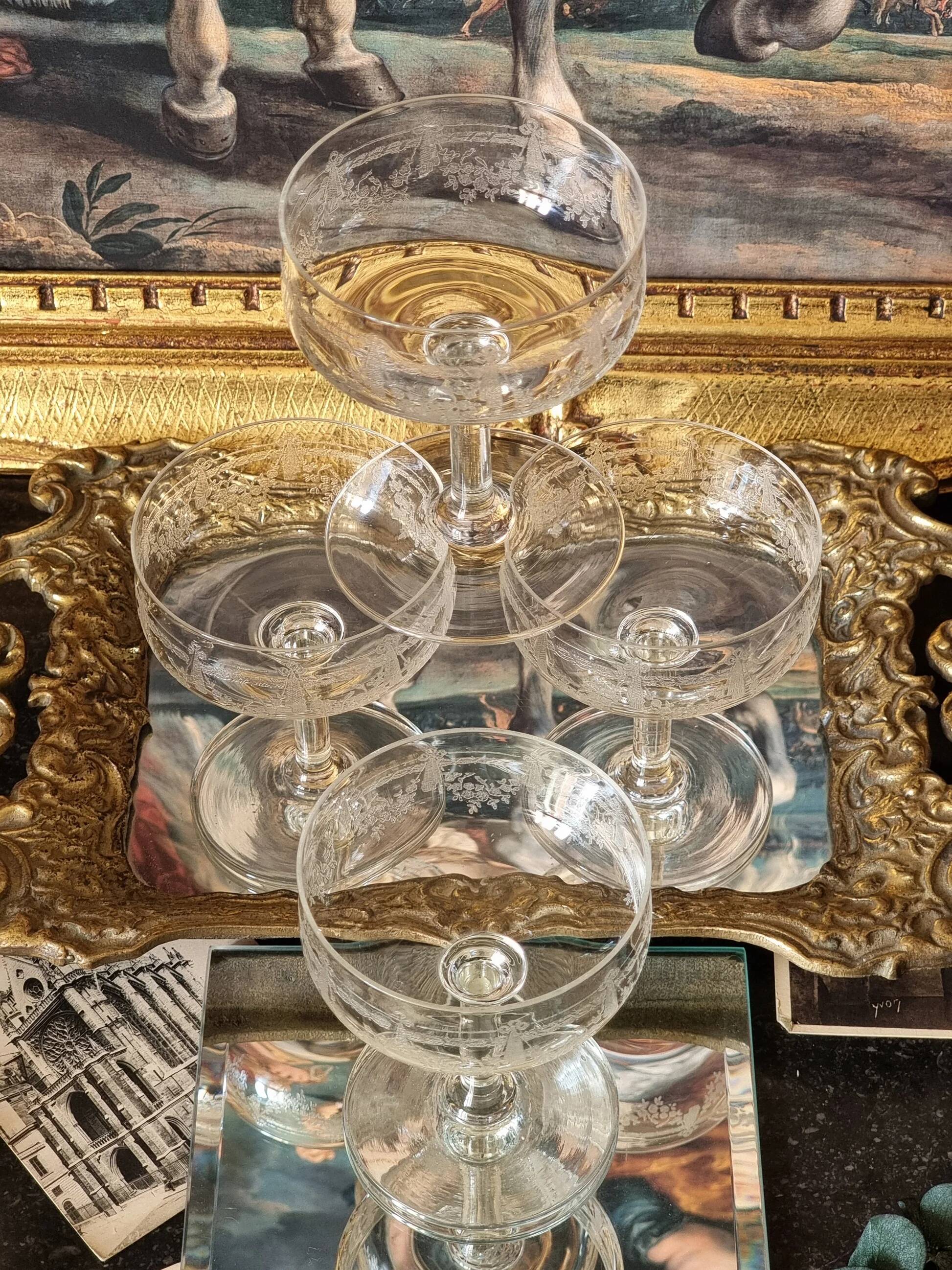 Engraved crystal champagne coupes