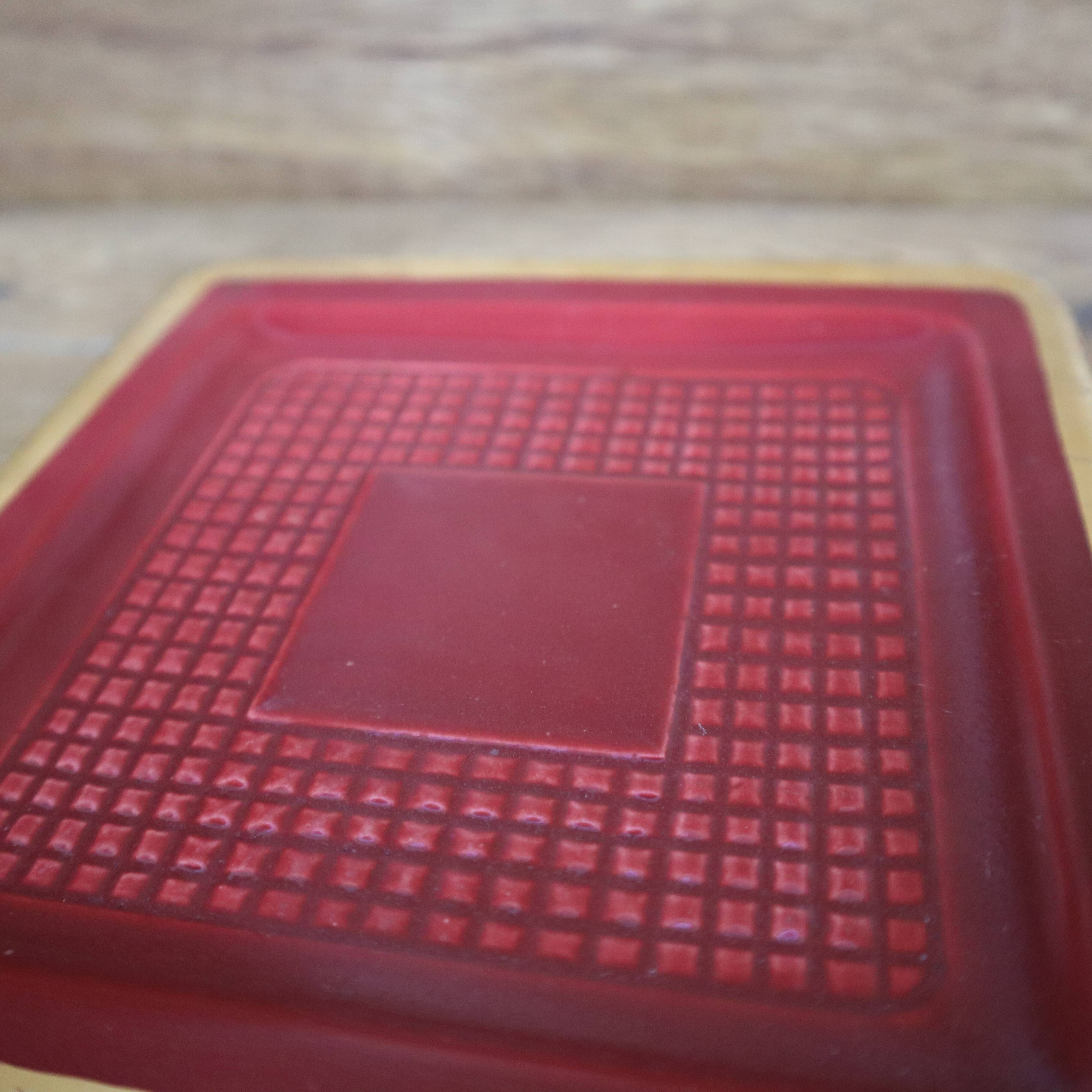 Saint Clément burgundy pocket emptier with gold trim