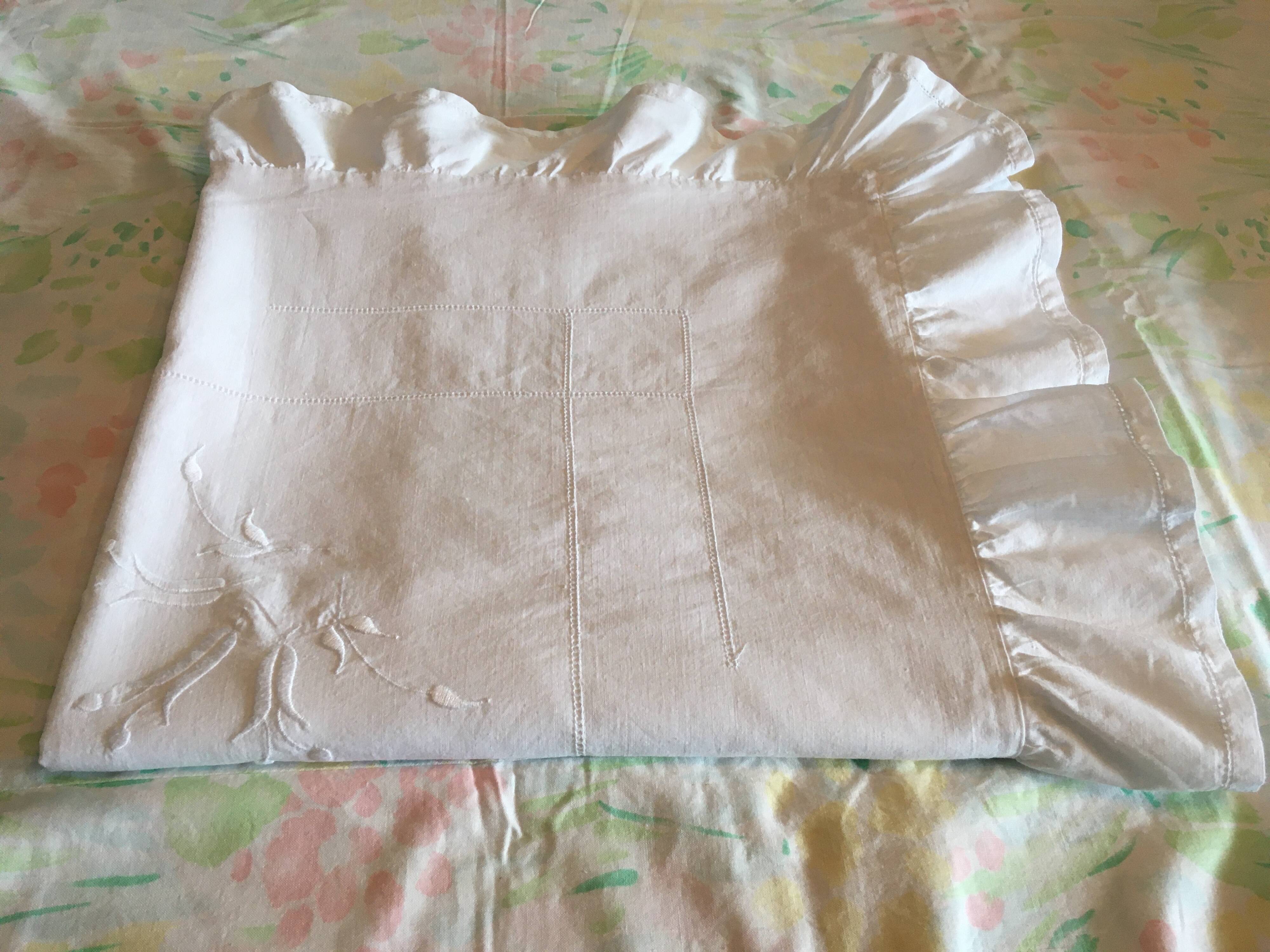 An antique embroidered duvet cover