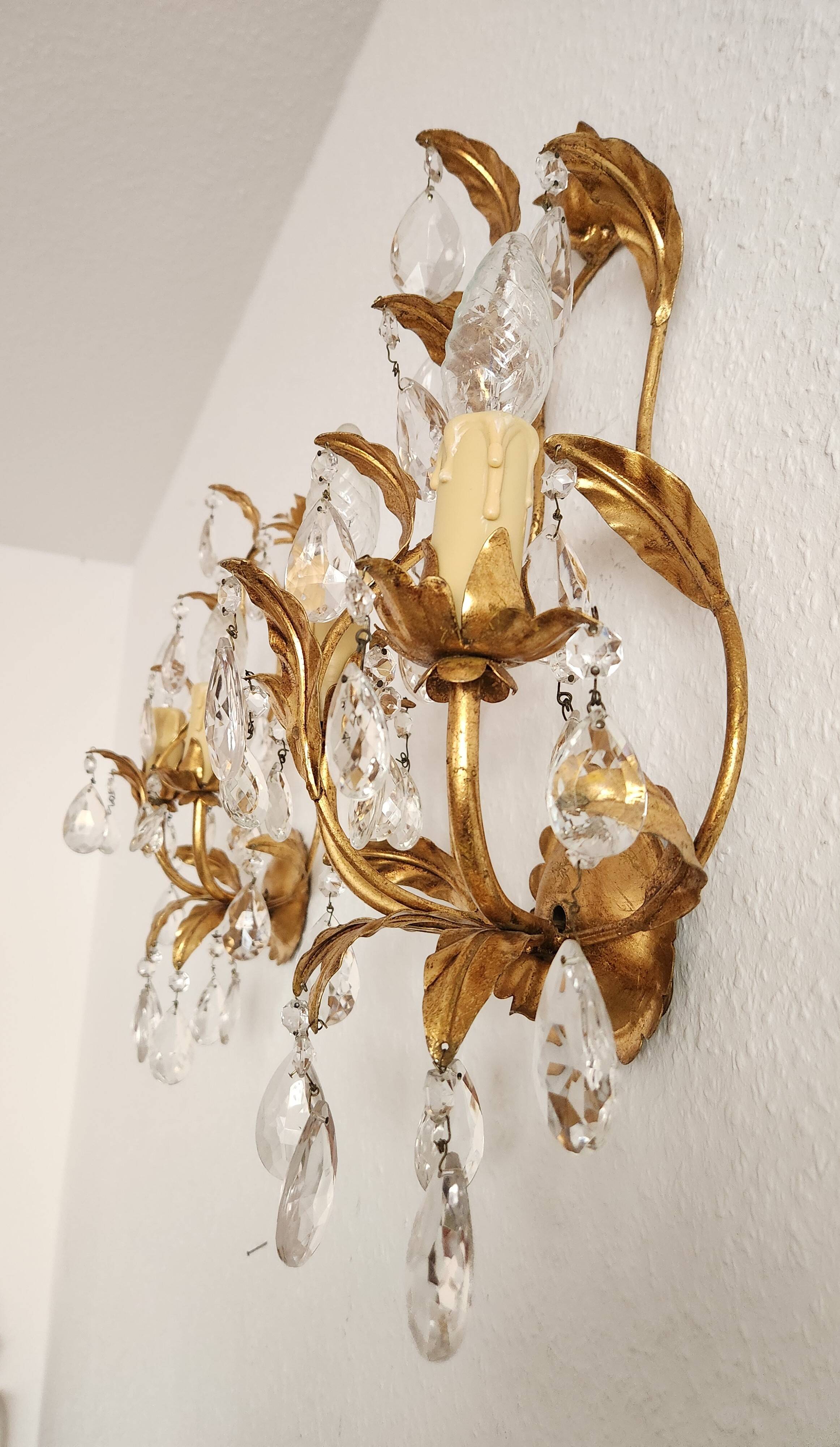 Hand-forged wall lamp gilded with gold leaf and crystals, Italy