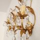 Hand-forged wall lamp gilded with gold leaf and crystals, Italy